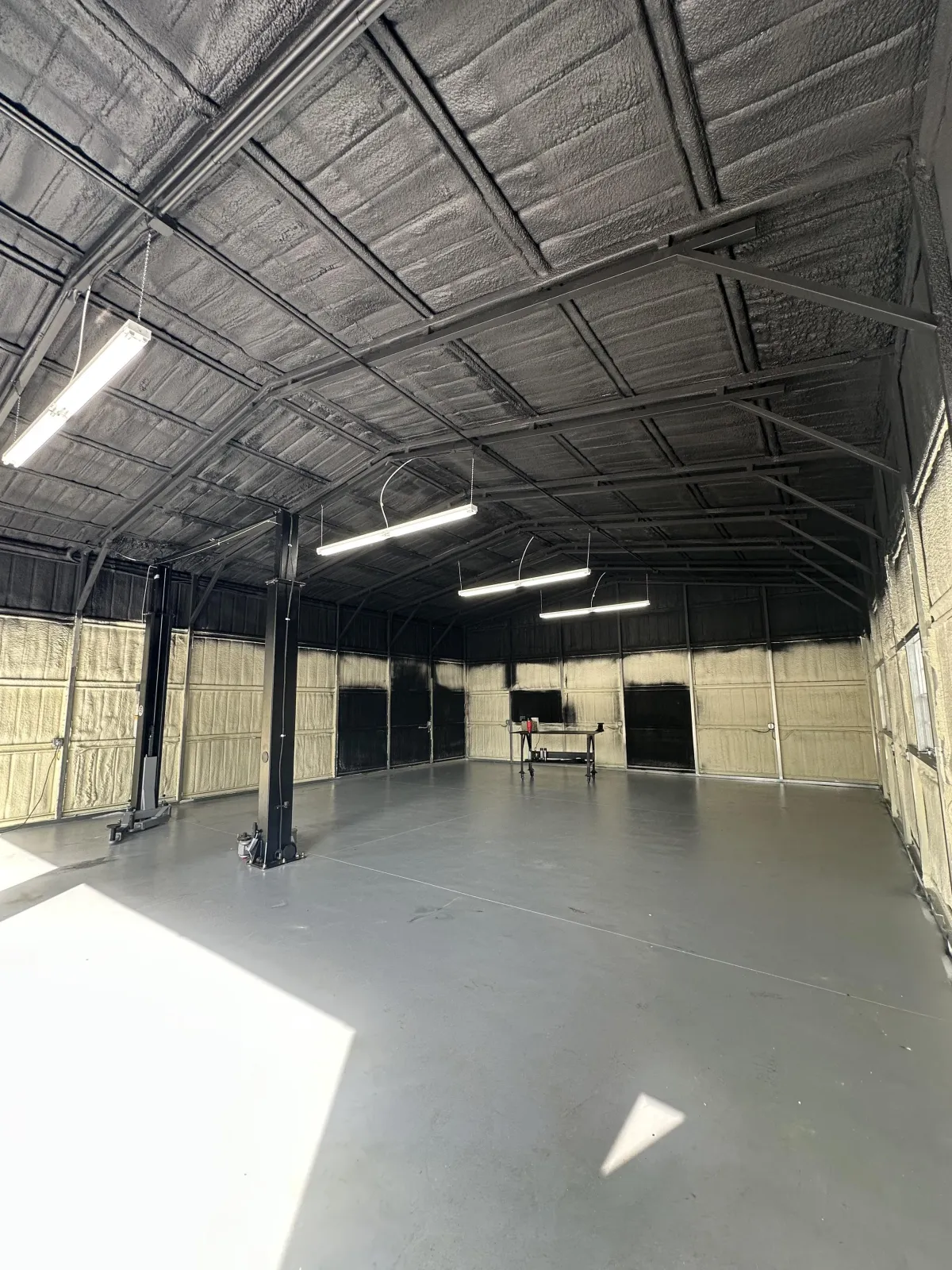 black metal frame with glass roof