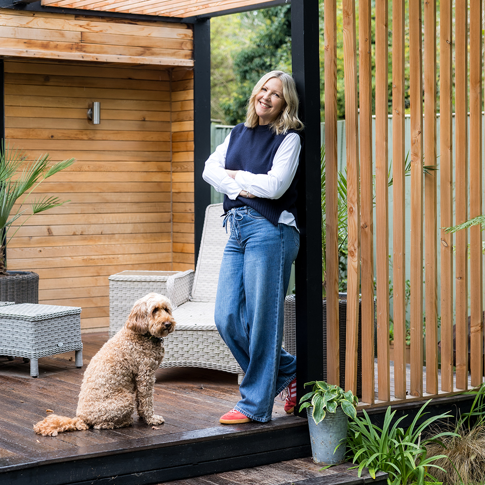 Personal branding photography for Creative Hub hairdressers in Bedfordshire holding hairdryers playfully like guns - creative business photography