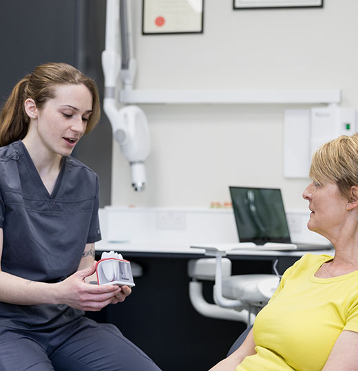 Commercial photography by Becky Kerr  Bedfordshire dentist consulting with a patient about Invisalign 