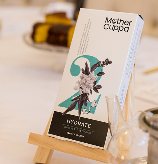 Product photography of Mother cuppa tea package in a table with a teapot in Bedford