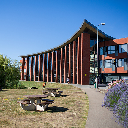 school website photography of the outside of the front of the college 