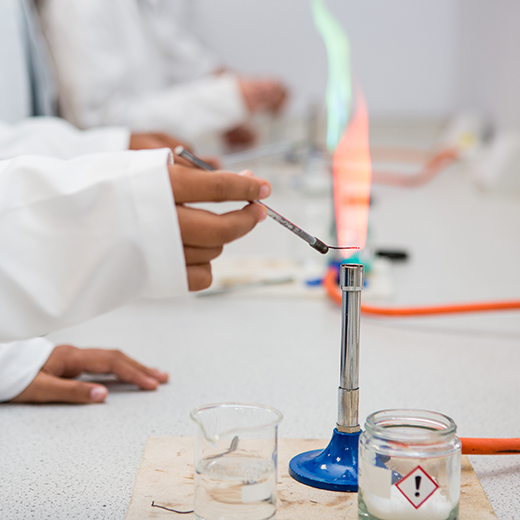Commercial photography by Becky Kerr  Bedfordshire of a school lighting a bunsen burner 