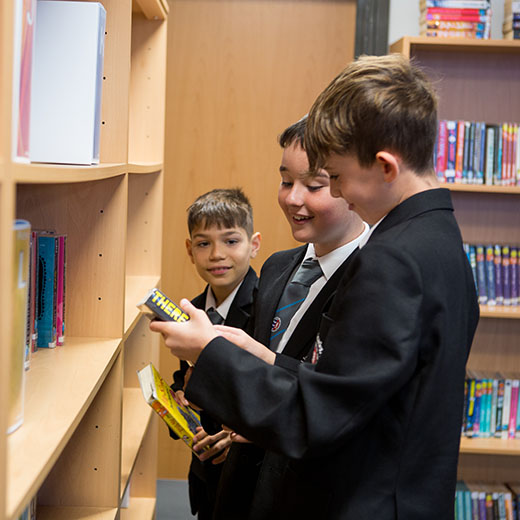 advertising photography for schools in Bedfordshire boys in a Libiary 