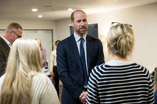 Event Photography of Prince William as he talks to award winner.