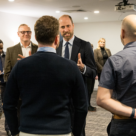 Events photography of Prince William talking to people
