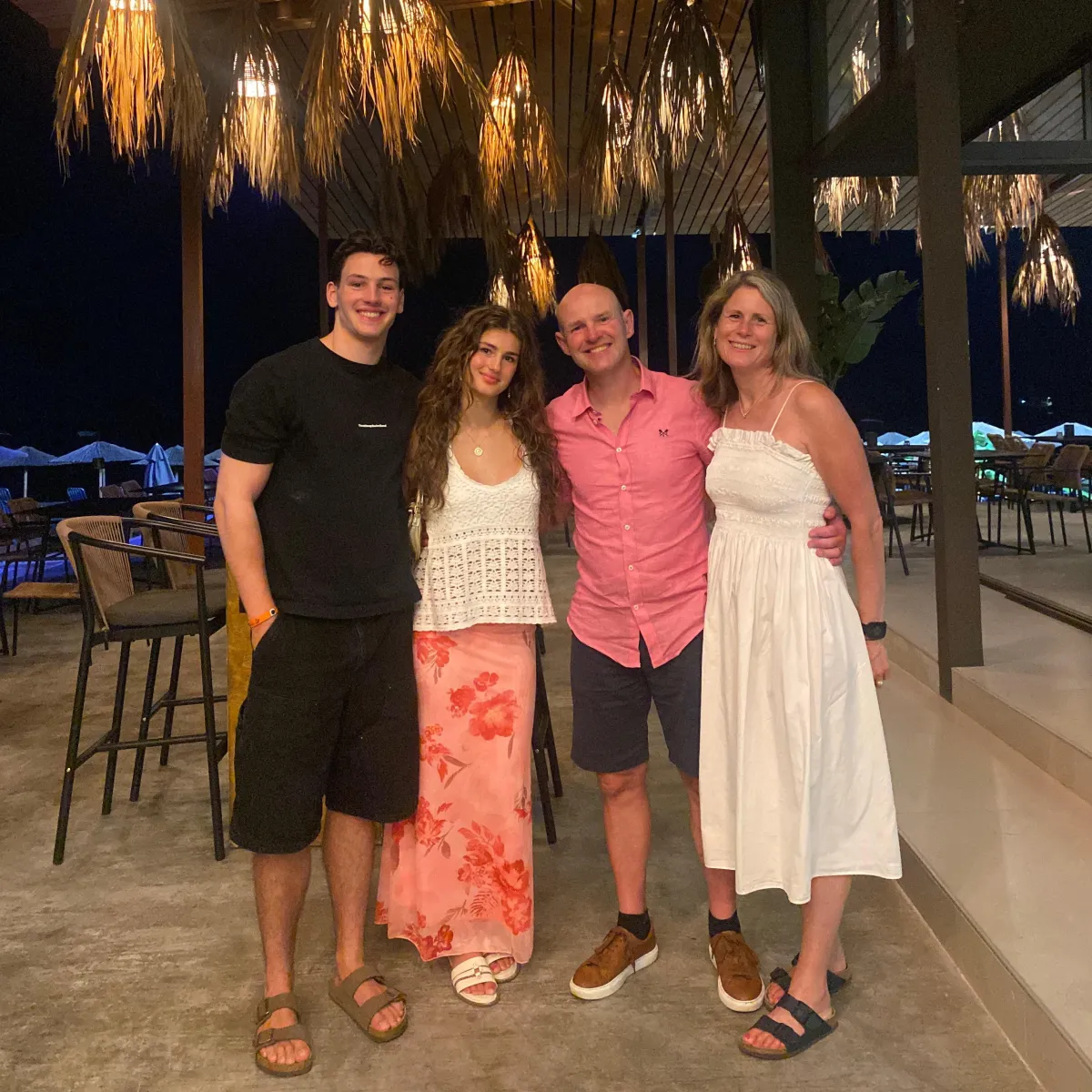 Becky Kerr photography with her family on holiday in Greece all smiling at looking at the camera 