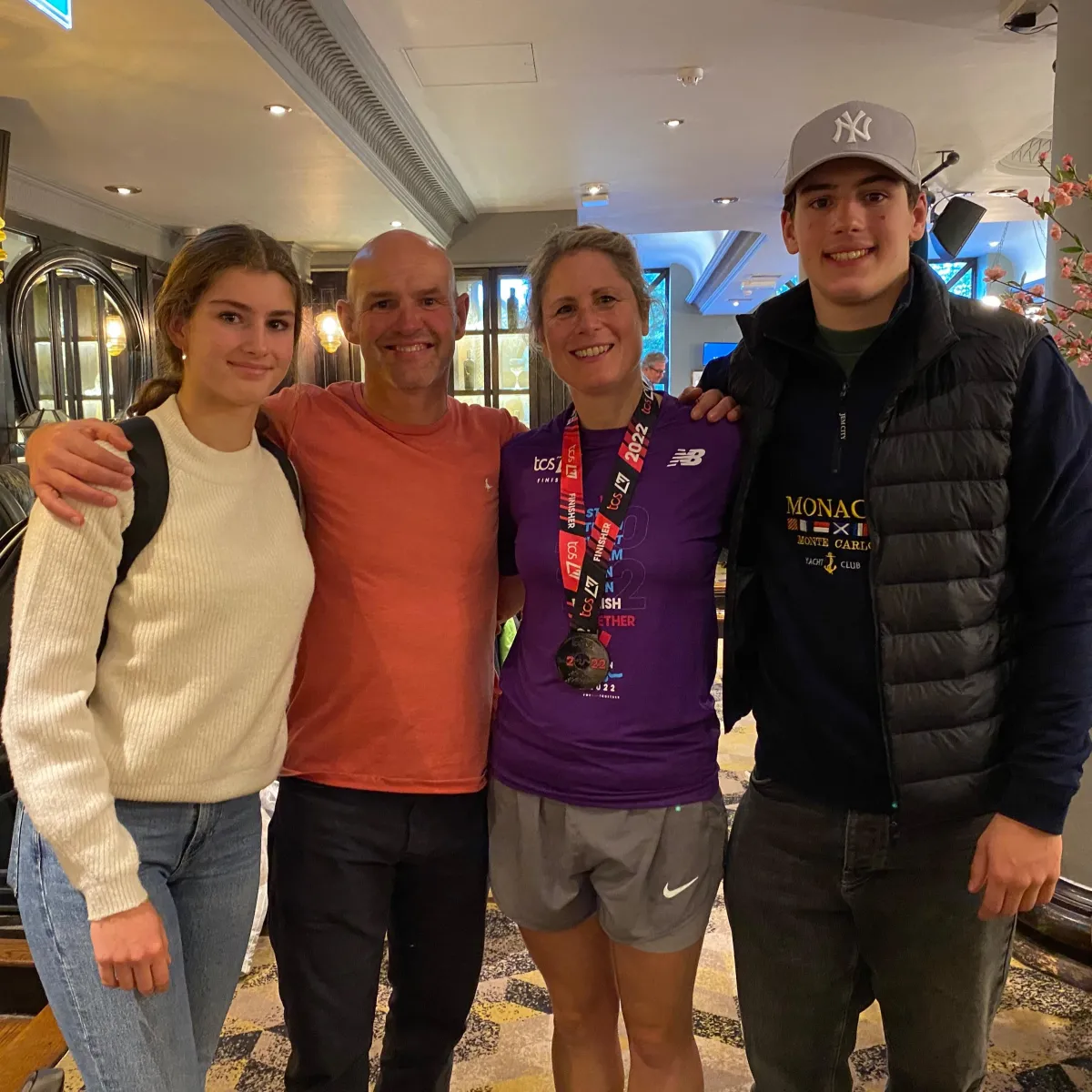 a photo of Becky kerr photography and her family after she has completed the London marathon