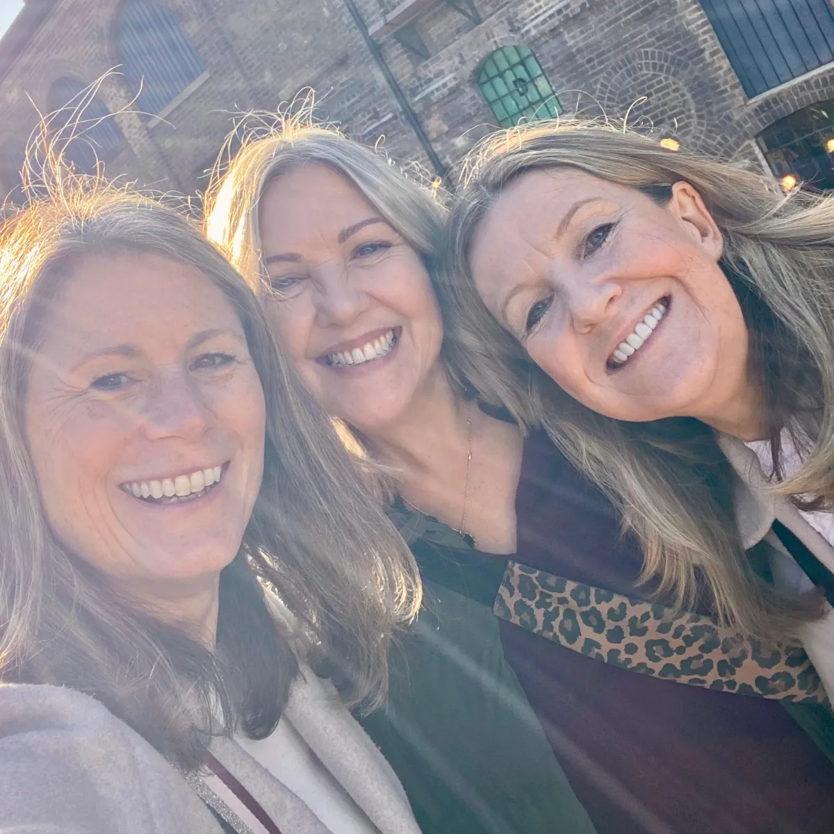 becky kerr photography with her friends in the sunlight  in London 