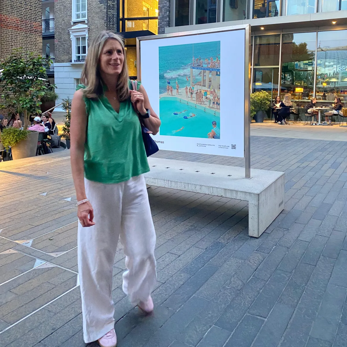 a photo of becky kerr  photography outside an street photography exhibition in  London 