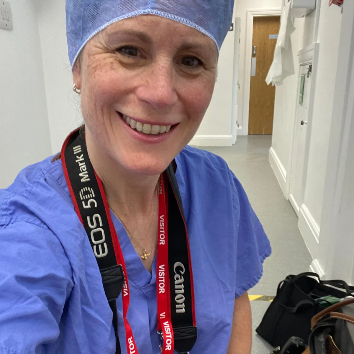 A photo of Becky Kerr photography in medical scrubs