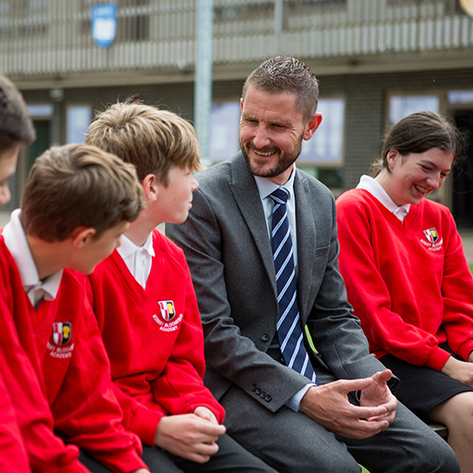 marketing schools photography of a headmaster and the students