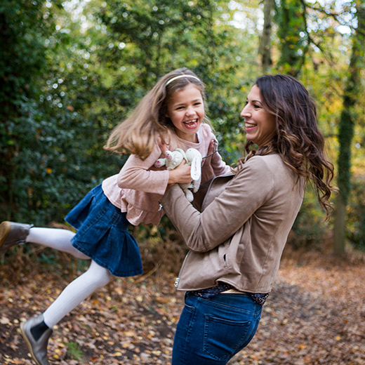 family portrait mother and daughter laughing