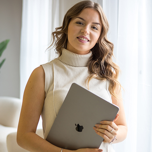 coContent creator holding a laptop  Bedfordshire commercial portaits