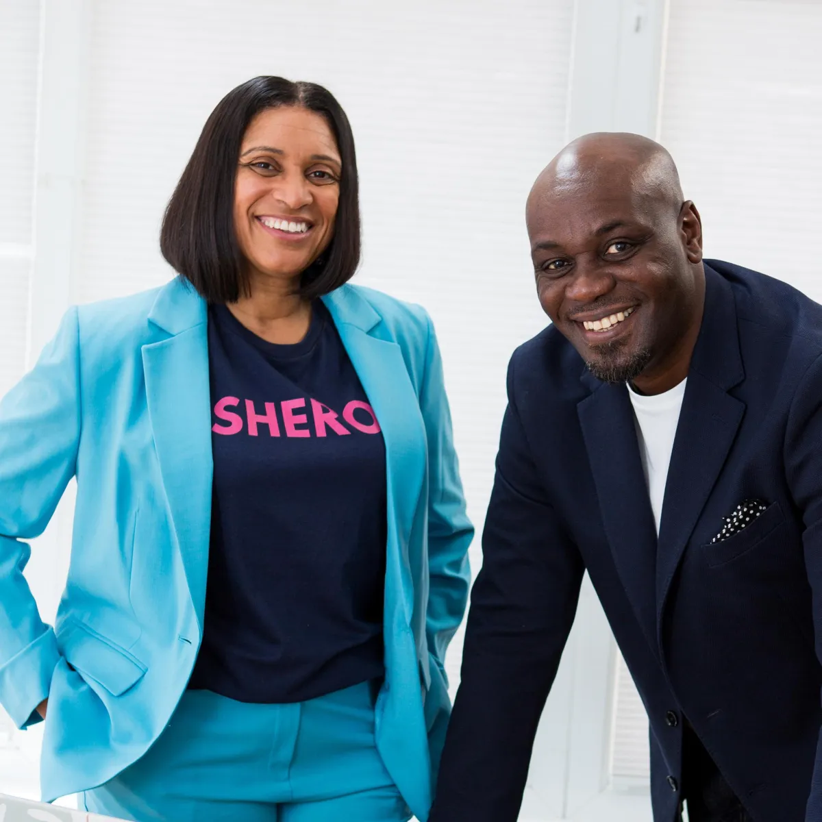 Bedfordshire headshot photography 2 people in suits looking to camera in an office 