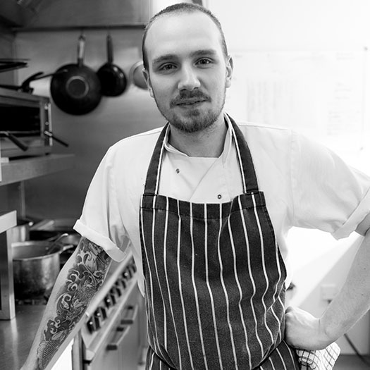 Chef in the kitchen, black-and-white image