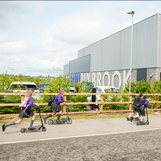 Group of children outside a Bedfordshire school building