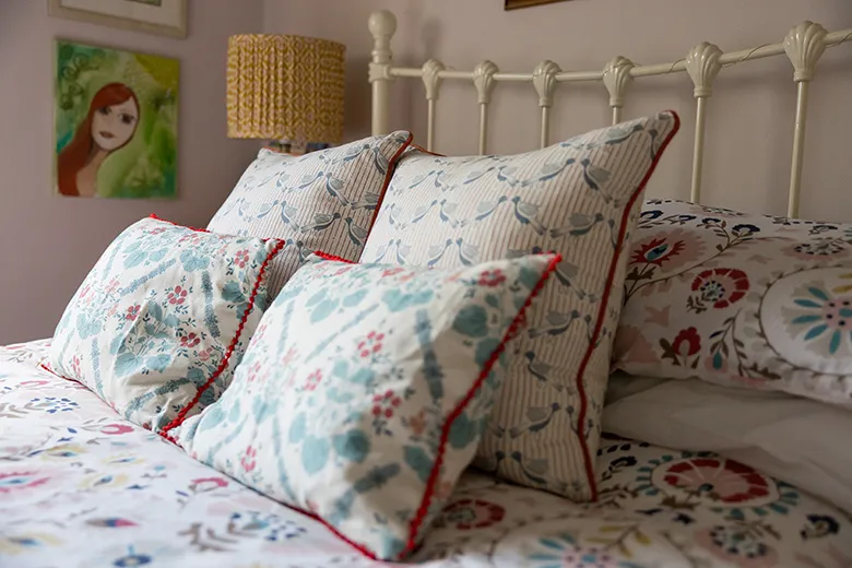 advertising photography in Bedfordshire of bed with patterned cushions