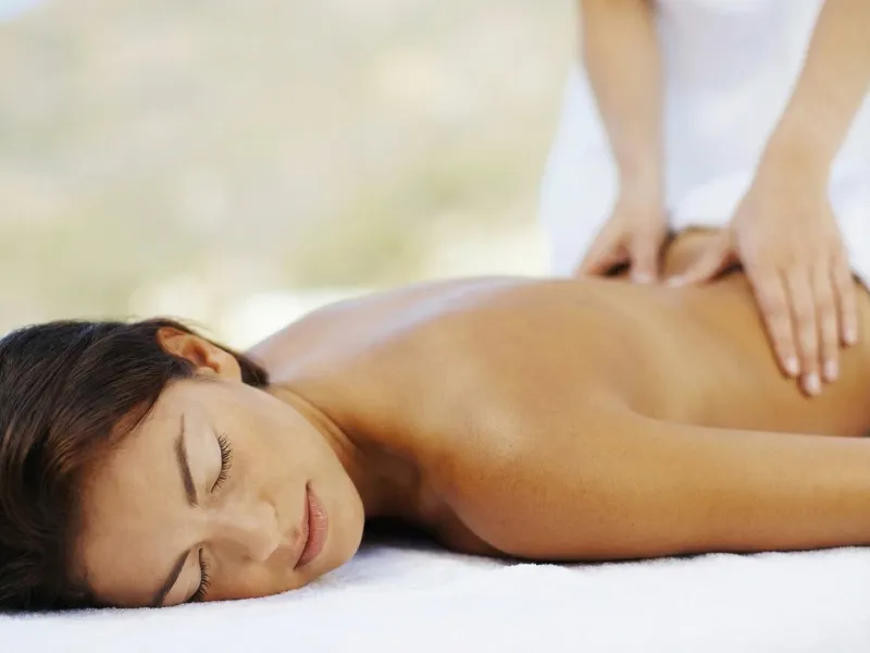 Women’s therapeutic massage focused on pelvic health support