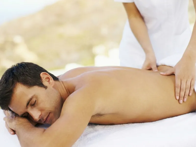 Men’s therapeutic massage focused on circulation support