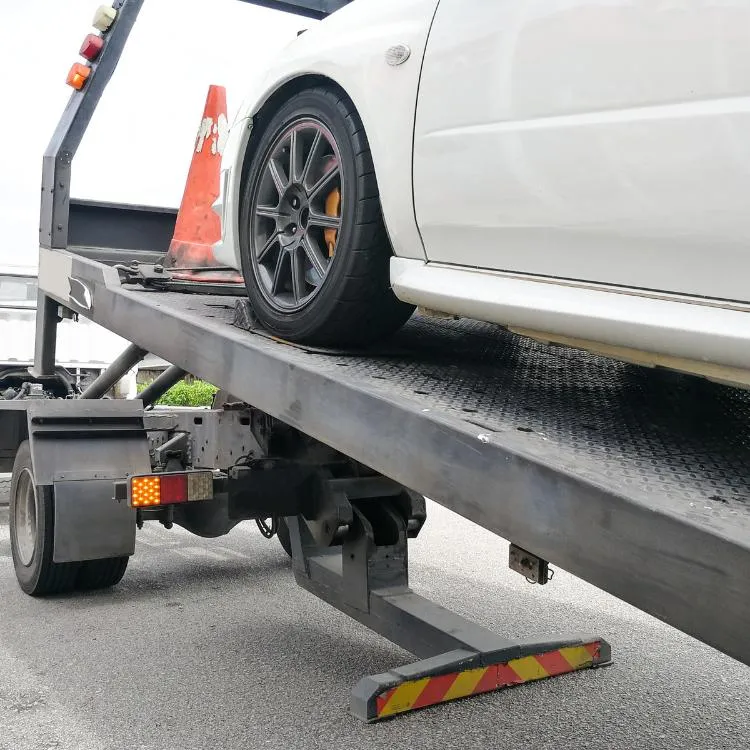 SUV being towed by a tow truck