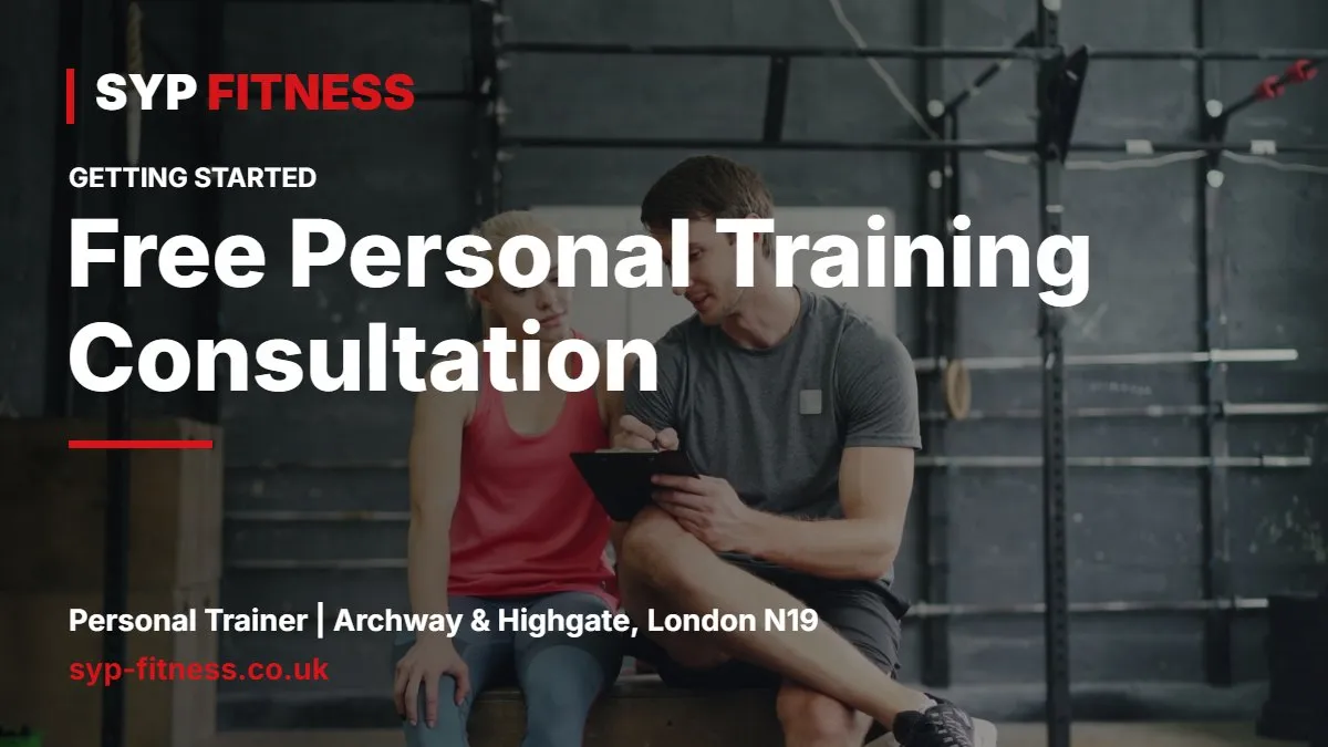 Personal trainer and client talking at a table with a notebook in a training studio - Free Personal Training Consultation: What to Expect, SYP Fitness personal trainer Archway N19