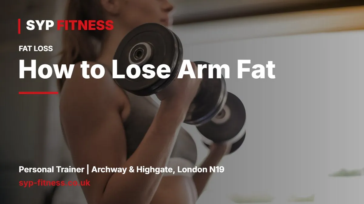 Woman doing a dumbbell shoulder press in a gym - How to Lose Arm Fat: Why Toning Is a Myth and What Works, SYP Fitness personal trainer Archway N19