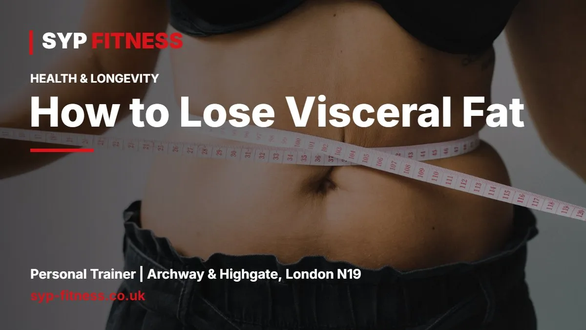 Man measuring his waist with a tape measure in a bright kitchen - How to Lose Visceral Fat: The Hidden Belly Fat Plan, SYP Fitness personal trainer Archway N19