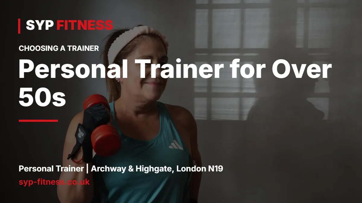 Woman in her fifties doing a goblet squat with a kettlebell while a trainer guides her - Personal Trainer for Over 50s: What to Look For and Expect, SYP Fitness personal trainer Archway N19