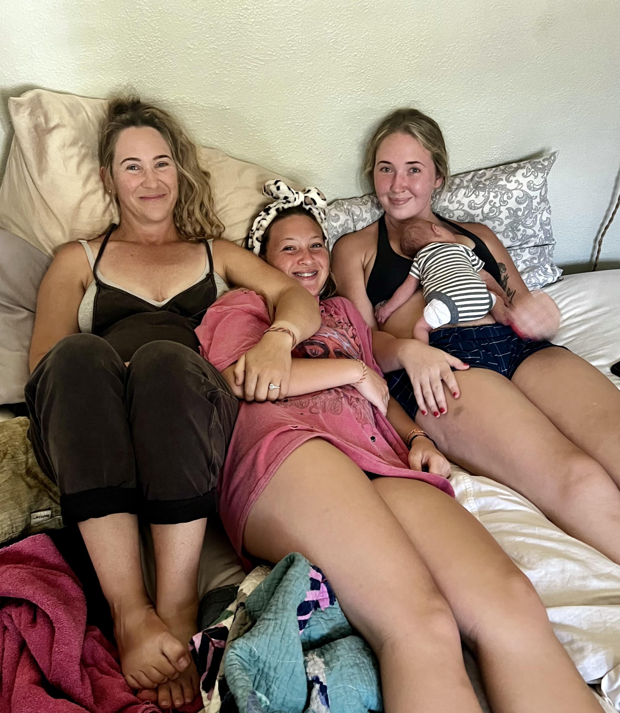 Britni smiling with her 3 daughters