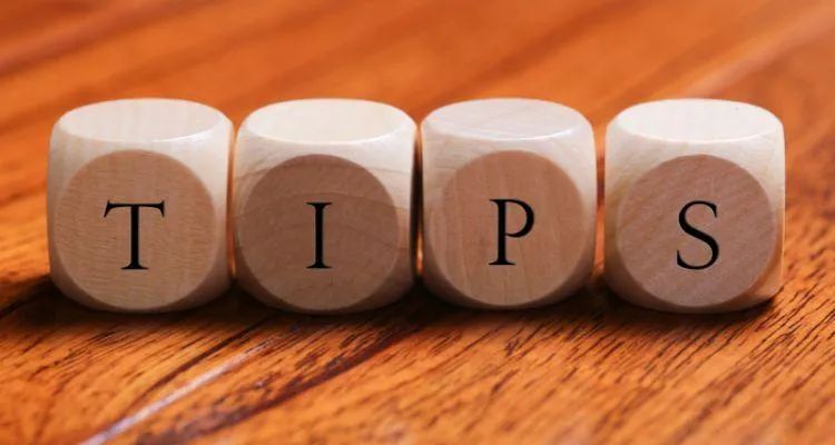 person in black jacket holding umbrella