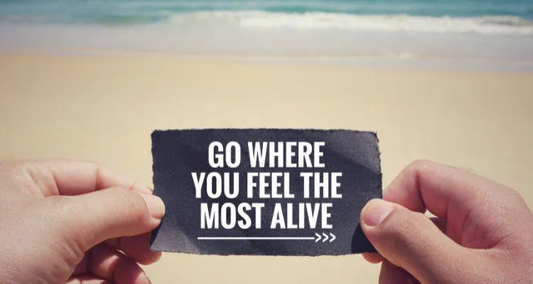 red hard hat on pavement\