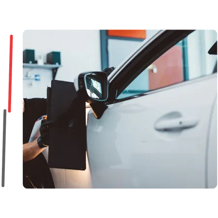 A+ Dent Medic Repair Technicians repairing car dents