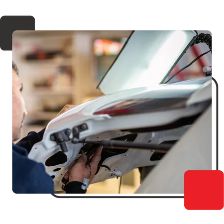 A+ Dent Medic Repair Technicians repairing car dents