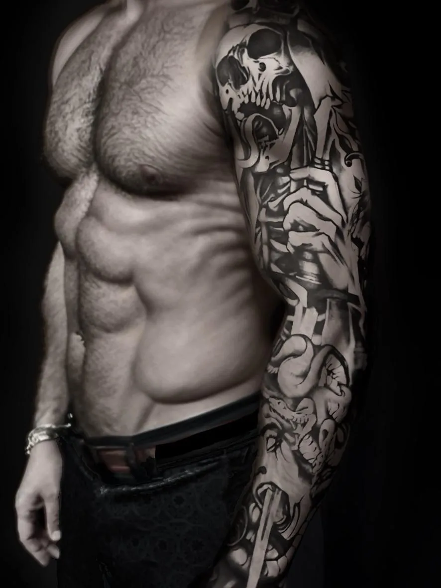 Blackwork sleeve tattoo of the Lich King’s sword piercing Medusa, featuring skulls and fantasy realism by Alek the Saint, Point Loma, San Diego.