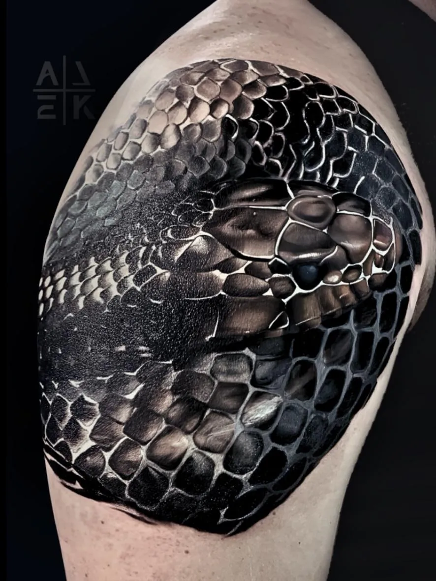 “Hyper-realistic color snake shoulder tattoo with 3D scales, detailed texture, and full cover-up by Alek the Saint, Point Loma, San Diego.”