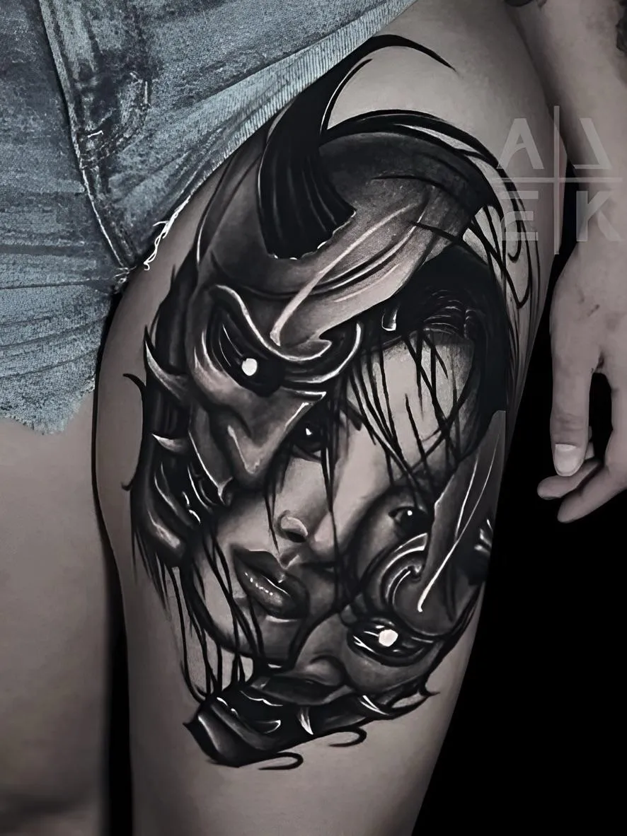 Samurai mask and female face thigh tattoo in black and gray realism by Alek the Saint, San Diego tattoo artist.