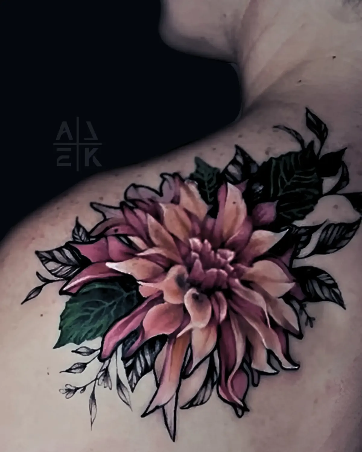 Color realism flower shoulder tattoo with bold black outlines and blackwork shading, created by Alek the Saint in Oceanside, Ca