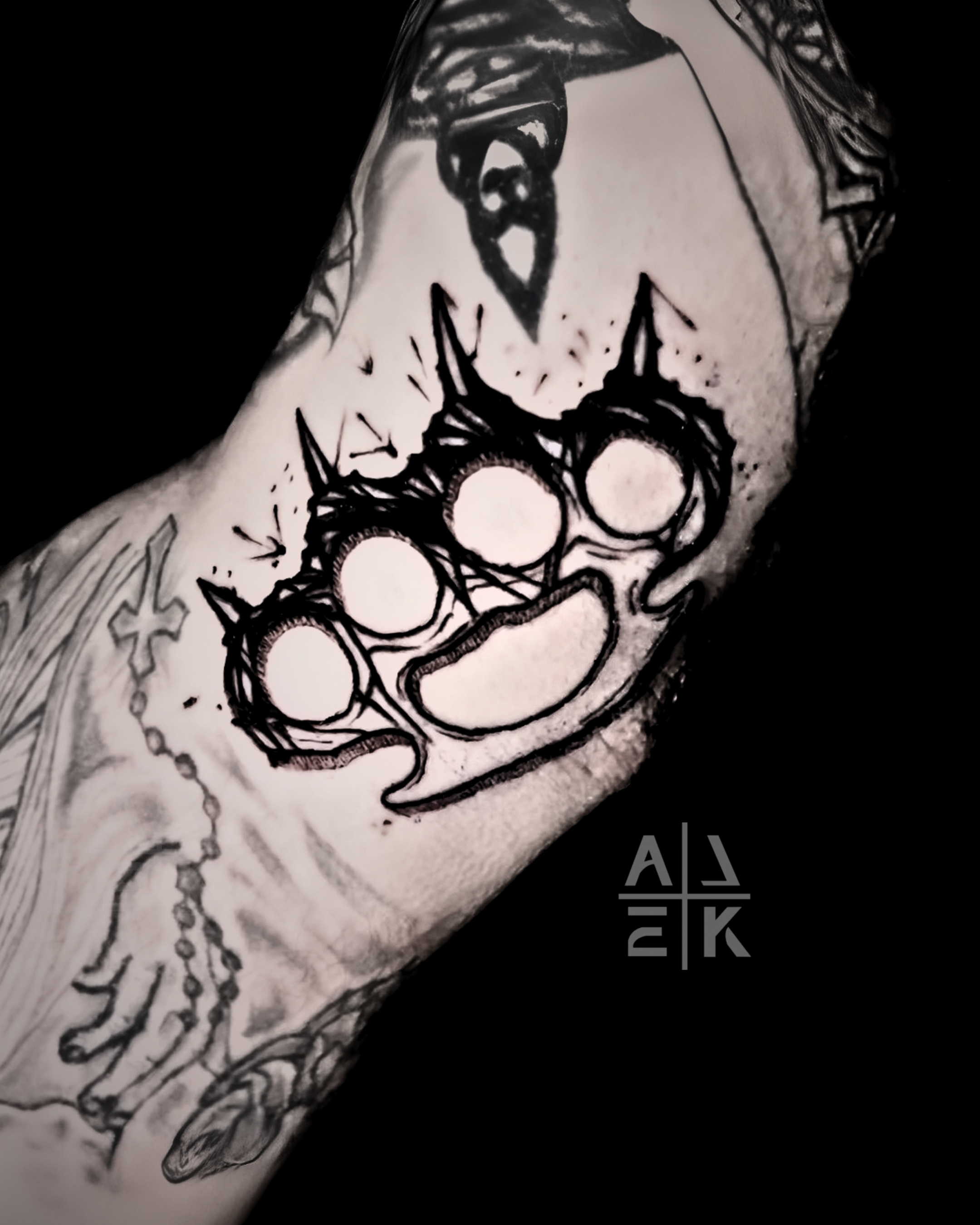 Blackwork sleeve tattoo of the Lich King’s sword piercing Medusa, featuring skulls and fantasy realism by Alek the Saint, Oceanside, Ca