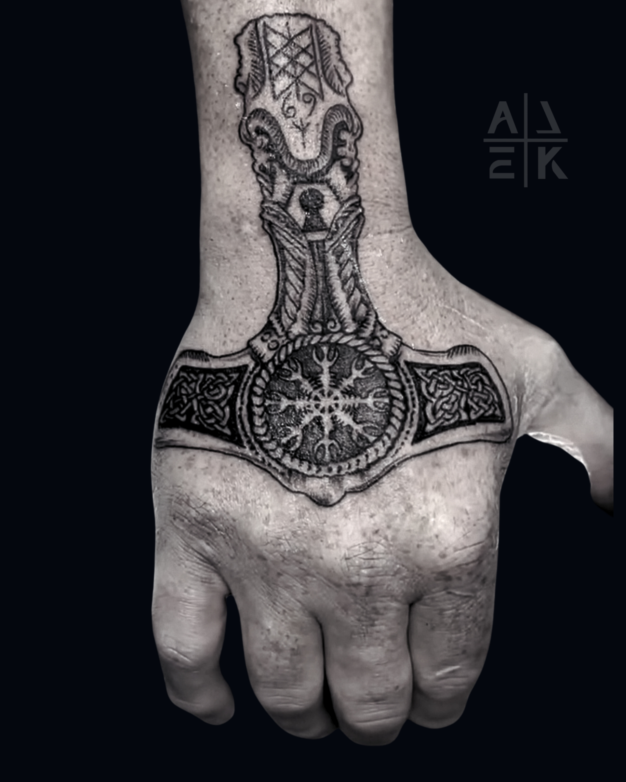 Viking blackwork tattoo covering chest and both sleeves, featuring Nordic knotwork and armor-pattern linework by Alek the Saint, Oceanside, Ca