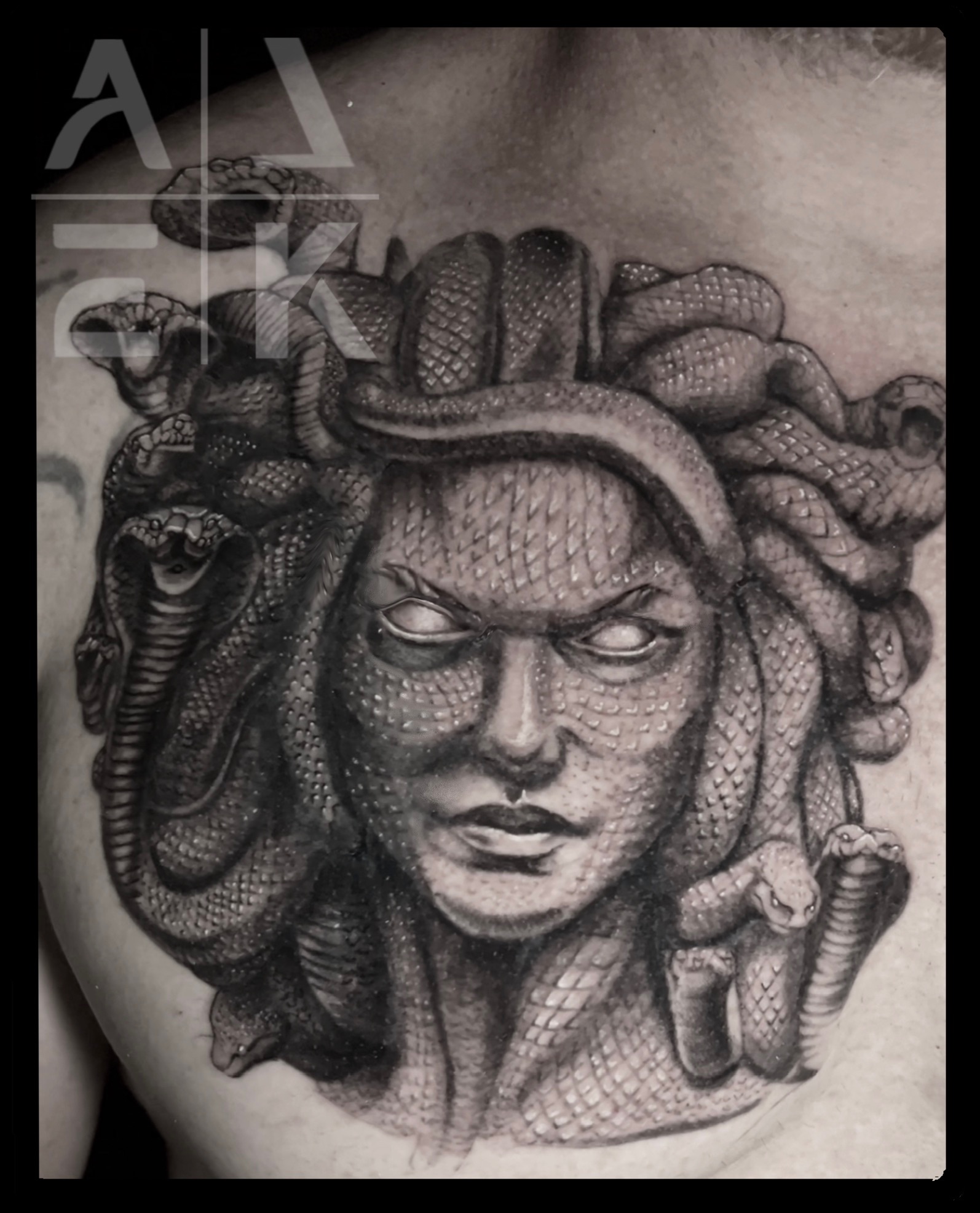 Samurai mask and female face thigh tattoo in black and gray realism by Alek the Saint,Oceanside, Ca ttattoo artist.