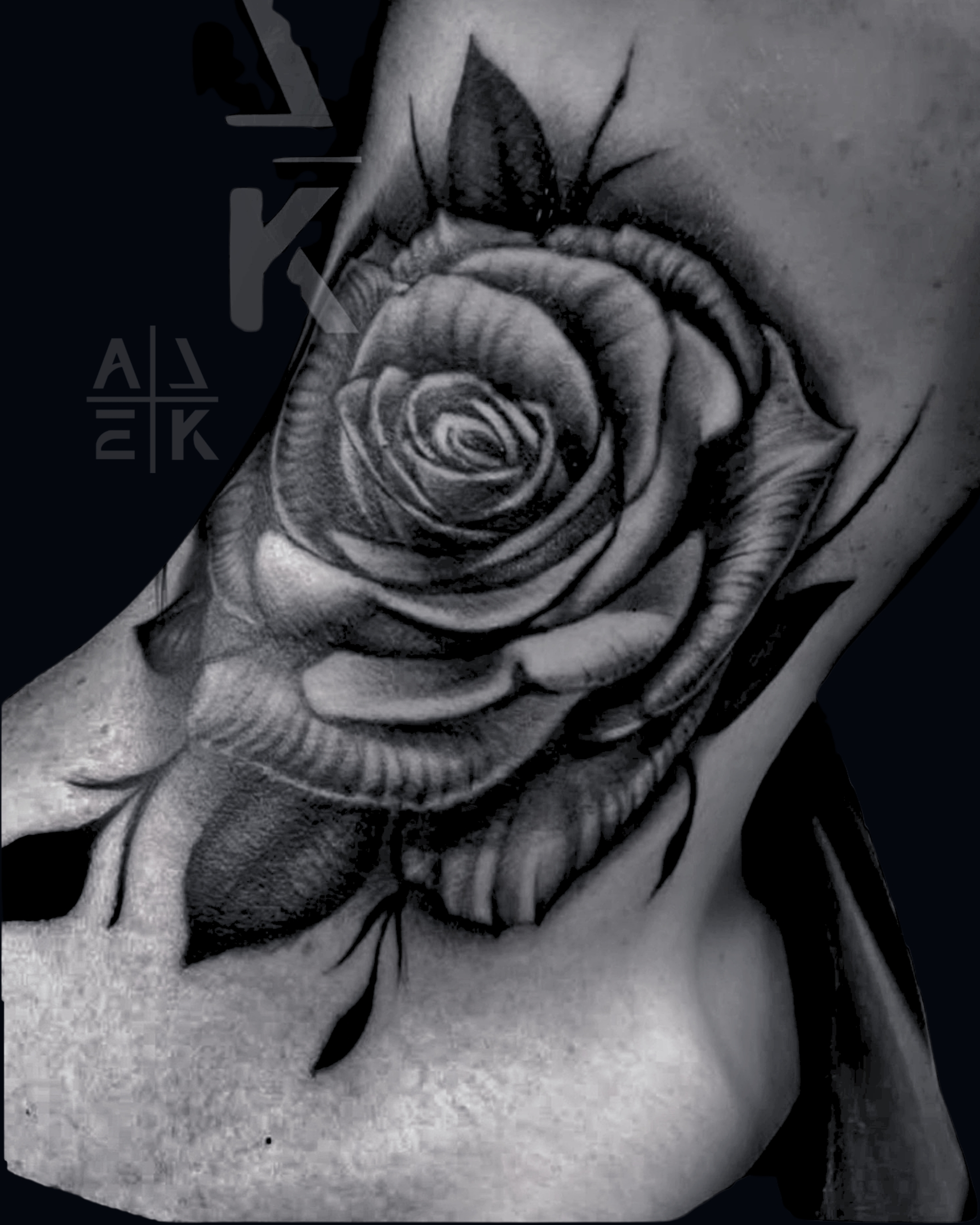 Black & gray koi fish thigh tattoo — a powerful cover-up blending Japanese waves with realism. By Alek the Saint in Oceanside, Ca
