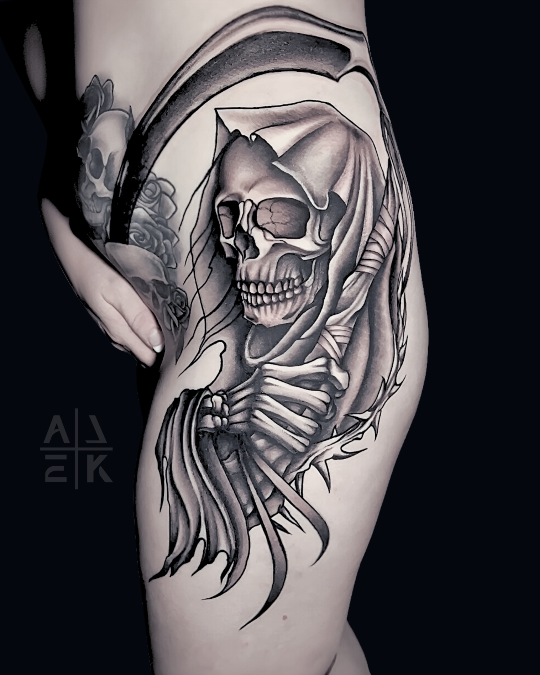 Samurai mask and female face thigh tattoo in black and gray realism by Alek the Saint,Oceanside, Ca ttattoo artist.