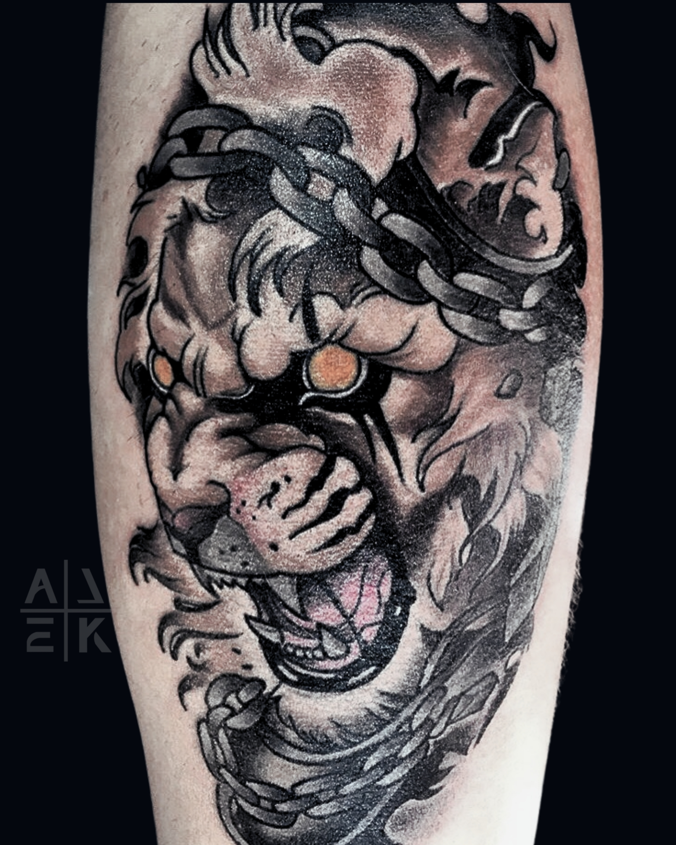 Color realism flower shoulder tattoo with bold black outlines and blackwork shading, created by Alek the Saint in Oceanside, Ca