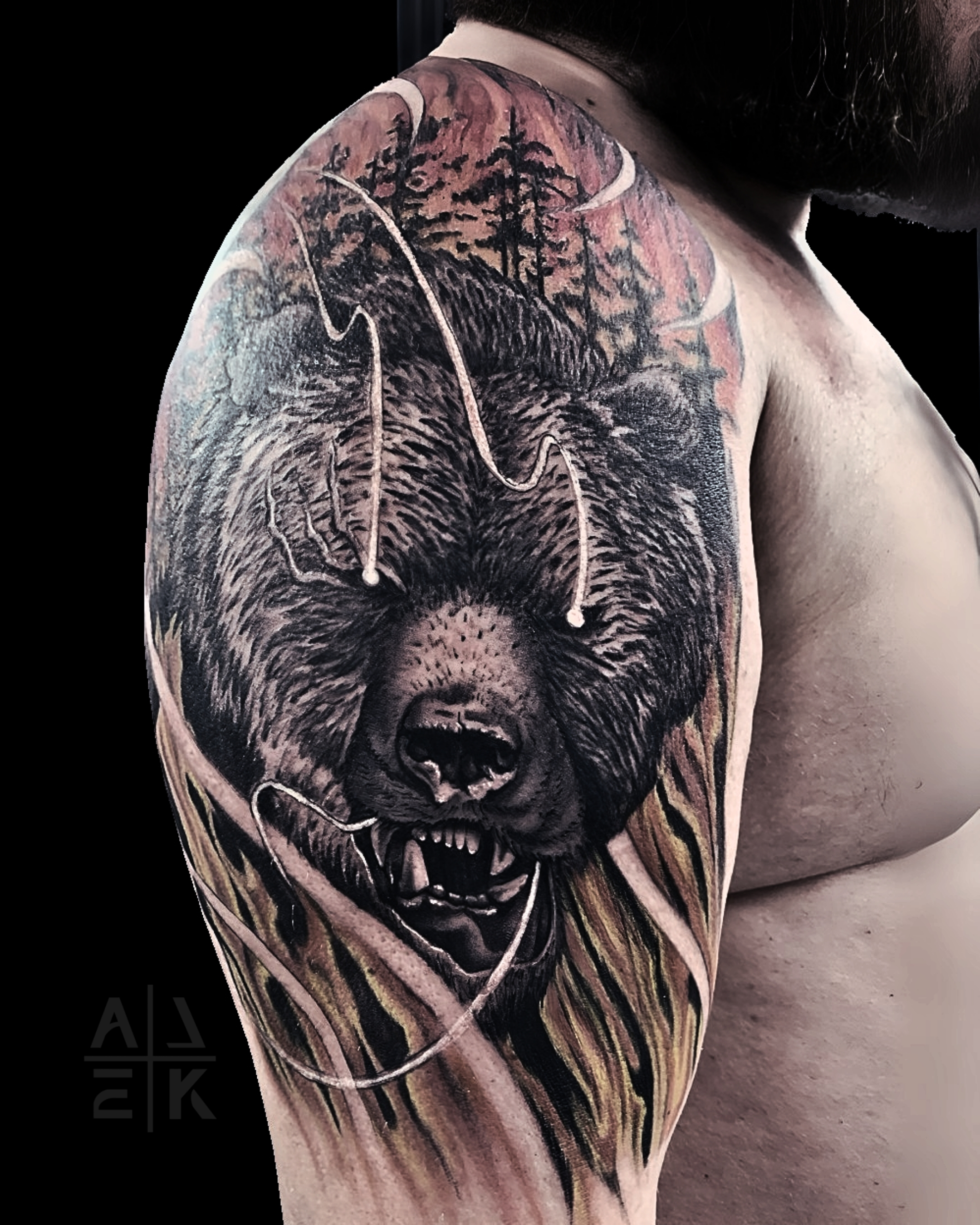 Color realism flower shoulder tattoo with bold black outlines and blackwork shading, created by Alek the Saint in Oceanside, Ca