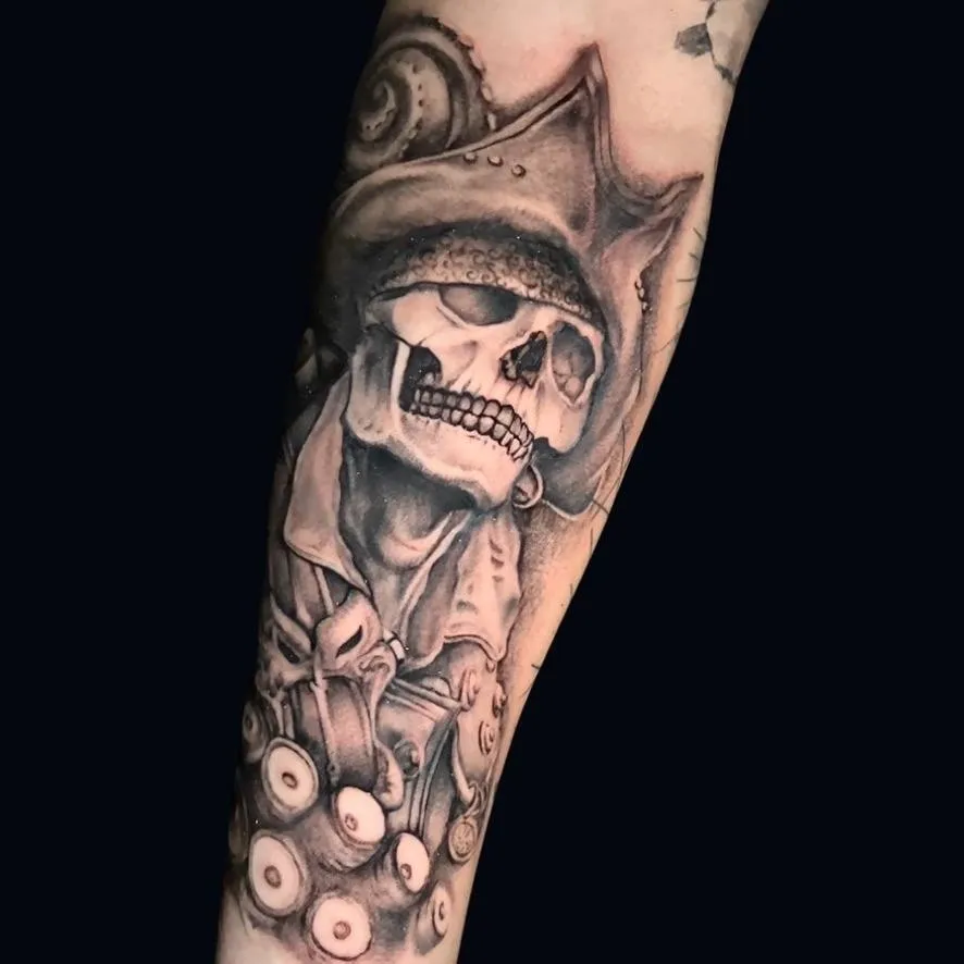 a tattoo of an undead pirate with tentacles in black and gray done in Oceanside, California