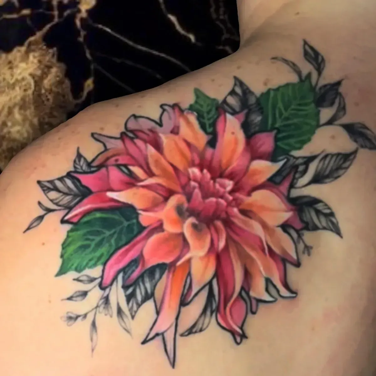Italia flower color realism tattoo, which traditional elements like pulled outline done in Oceanside, California by the Saint