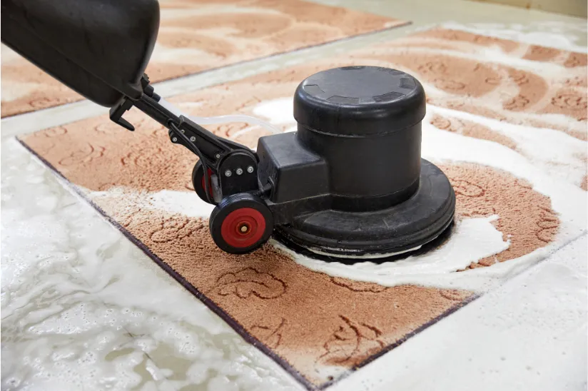 Close-up of a professional carpet cleaning machine using advanced techniques to deep clean a carpet, part of the services offered by Right Now Cleaning Services in Sydney.