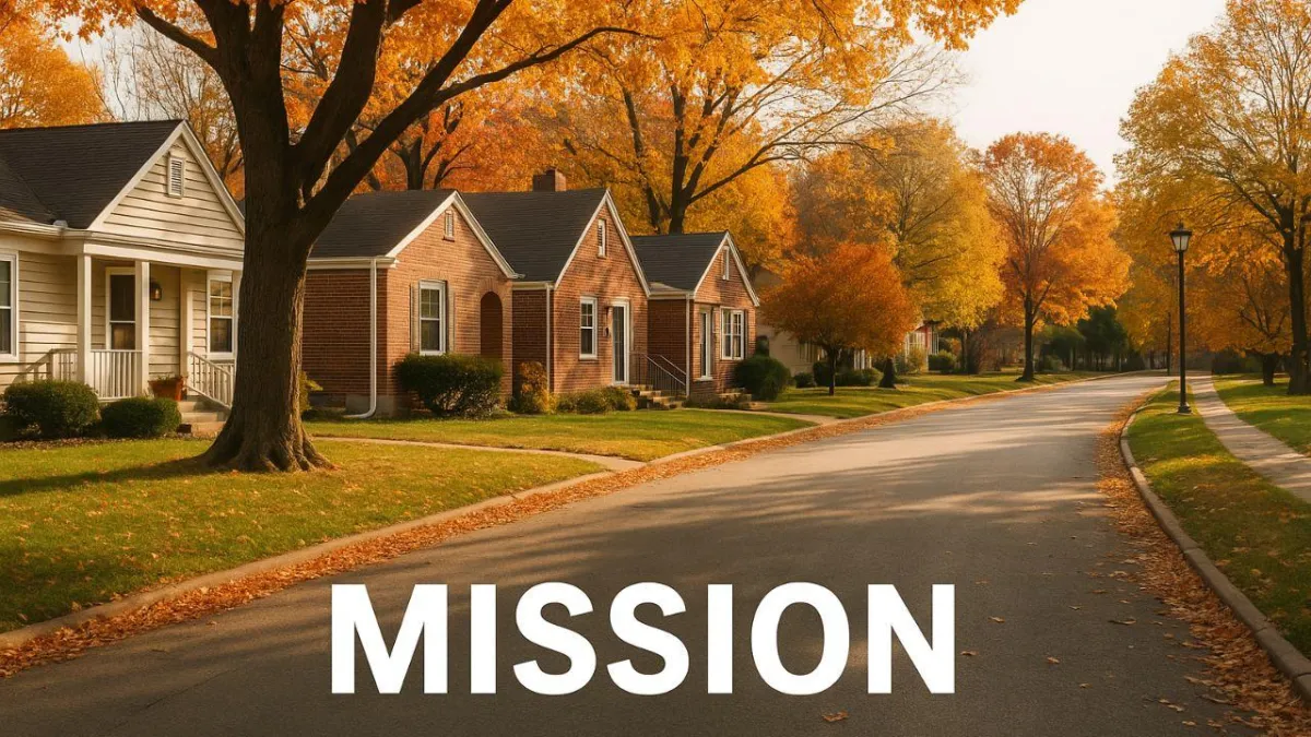 Residential street with single-family homes in Mission Kansas, autumn leaves, and neighborhood real estate view.