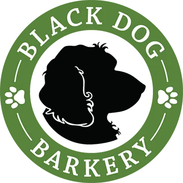 black dog outline in green circle black dog barkery logo