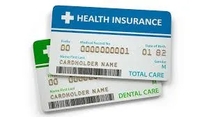 Health and dental insurance cards, representing comprehensive ACA health coverage options for medical and dental care.